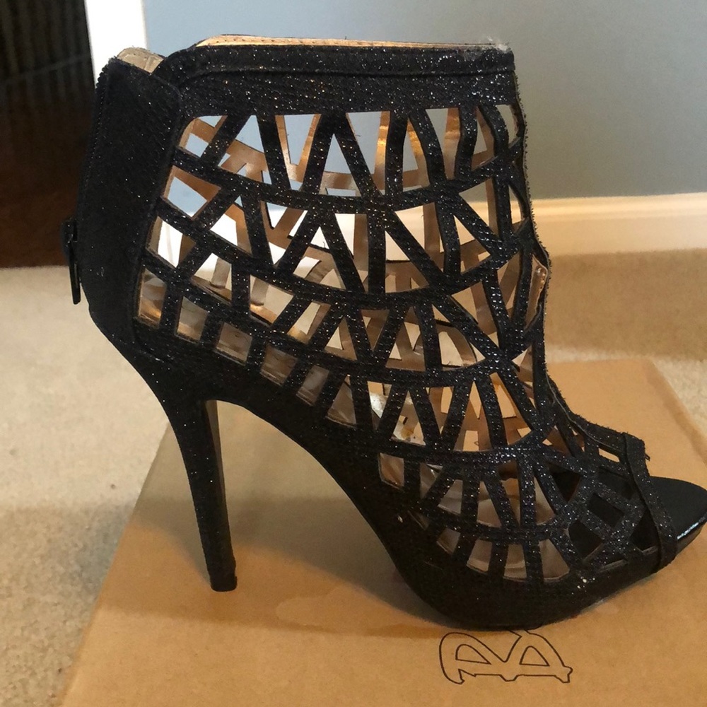 Black metalli laser cut ankle boots